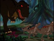 The sharptooth chasing a flock of small, beaked dinosaurs