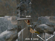 Press Jump and Action as you slide to grab the ledge. Pull up into the secret room.