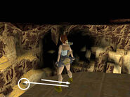 When you've got the positioning right, hop back once (to the spot shown above). Then press Forward then Jump to make Lara take a running jump right at the edge.