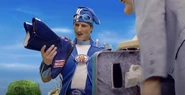 Sportacus looks at his "cleaned" shoes, not thinking much of it.