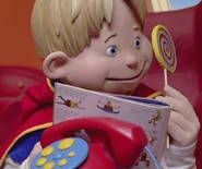 Ziggy reading Jives' storybook in "Crystal Caper"