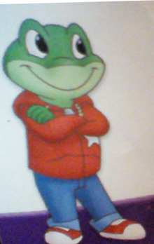 Leap the Frog in his red jacket, blue pants and red shoes..png
