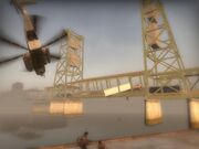 The bridge collapsing as the Survivors escape