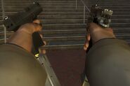 Dual pistols reloading.