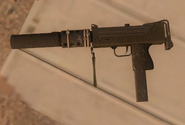 The Silenced Submachine Gun on a table.