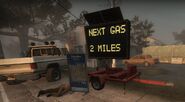 The trailer near the Ducatel Gas Bar which informs Survivors of the nearest gas station with fuel.