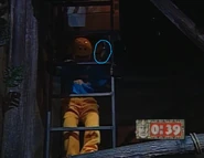 Kristin from The Lucky Pot-Bellied Pig of Amelia Earhart climbing down into the Dungeon. The other half of Scott McCaskell's pendant is circled.