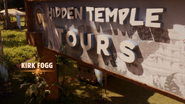 A green monkey can be seen on the illustration for the "Hidden Temple Tours" sign.