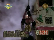 Annie from The Ruby Earring of Benzavov prepares to knock over the column.