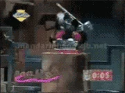 Kelly fumbling with the middle part of the Monkey as Time expires.