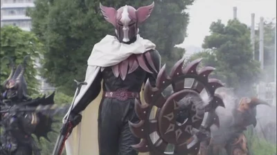 Apollo Geist holding his large magnum revolver with a bayonet sword attached on it within his left hand and his right hand holds a cutting bladed shield he uses to defend and to throw at his enemies with his Geist cutter move returning the shield to him like Captain America's shield
