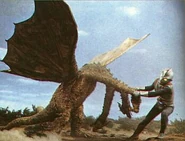 Zone Fighter fighting King Ghidorah