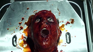 Akrak after removing the skin from one of her guinea pigs