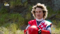 Mick reveals himself as one of the two additional Red Rangers.