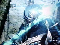 Zeltrax shooting lightning bolt shaped energy blasts from his sword.