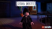 A screenshot from the official LEGO Dimensions Social Media of Lydia Deetz