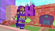 Starfire in front of Jump City High School