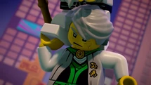 Garmadon wirft Wu in die Höhe, um die Schrumpfpille auf das Ultraböse zu schleudern.