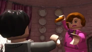 Umbridge preparing to use the Cruciatus Curse on Harry