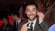 Aiden Turner with his minifigure counterpart at the Zurich premiere of The Hobbit: The Desolation of Smaug