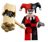 Harley Quinn with her hammer and a pistol