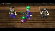 Two mime variants of Joker Henchmen beside The Joker in LEGO Batman 2.