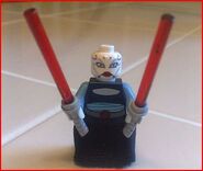 Asajj Ventress with her twin curved lightsabers.