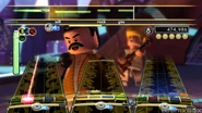 Freddie in-game (with John Deacon in the background)