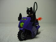 7779-032.jpg (167 KB) Catwoman on her motorcycle