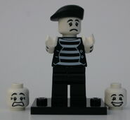 The Mime on his base with frown.