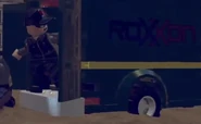Roxxon about to carry a cosmic brick on a truck.