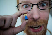 "Jeb" (Jens Bergensten), the current lead developer of Minecraft holding a Steve Micro Mob