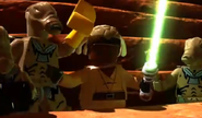 Adi Gallia in a cutscene in LEGO Star Wars III (green-bladed lightsaber in cutscene only).