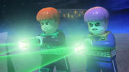 Guy Gardner and Greenzarro using their Lantern Rings.