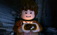 Frodo with The One Ring in the teaser for LEGO The Lord of the Rings: The Video Game