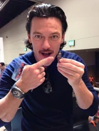 Luke Evans with his minifigure counterpart at San Diego Comic Con.