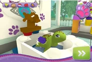Turtle getting scrubbed in Pet Salon Game