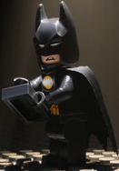 Batman on his phone