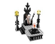 Saruman on his throne with both staffs
