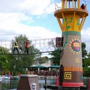 Monka warriors crossing the rope bridge