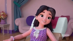 A cat in a historical dress wearing a bonnet.