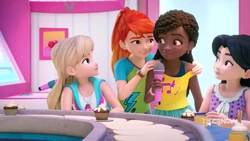 Mia stopping Andrea from singing a second song.