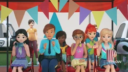 Stephanie stopping Mia from having popcorn.