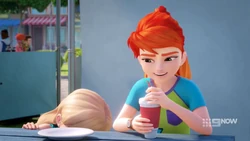 Still looking for her sandwich, under the table now.