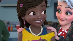 Dottie Rae puts her necklace on Andrea.