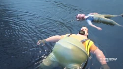 Joey and Ricky floating on the lake.