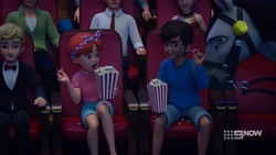 Barney warning them to stop throwing popcorn.