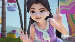 Emma posing for a caricture sketch.