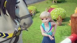 Stephanie telling Barney how to jump over the obstacle.