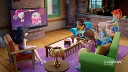 Mia brings the gift of popcorn.